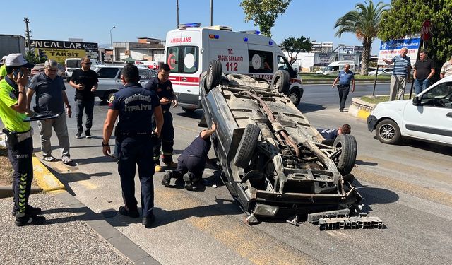 Efeler’de otomobil takla attı 2 kişi yaralandı