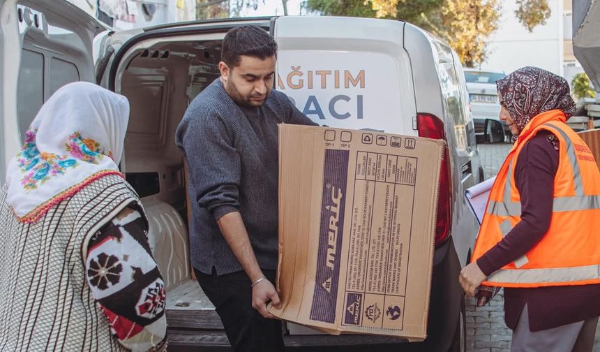 Kuşadası Belediyesi'nin soba yardımı başladı